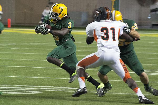 The Wildcats tallied 507 offensive yards in the season opener at home on Saturday, while the defense forced four turnovers that resulted in three touchdowns for NMU to pick up the 41-31 victory over the Findlay Oilers. (Photo: Anthony Viola)