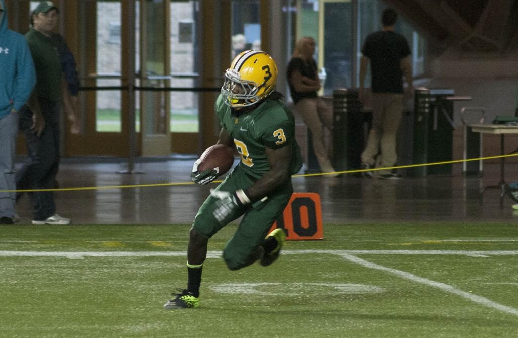 Senior wide receiver Christian Jessie (3) had 20 receiving yards and a 20-yard kick-off return against the Huskies at the Michigan Tech home field. (Anthony Viola NW)