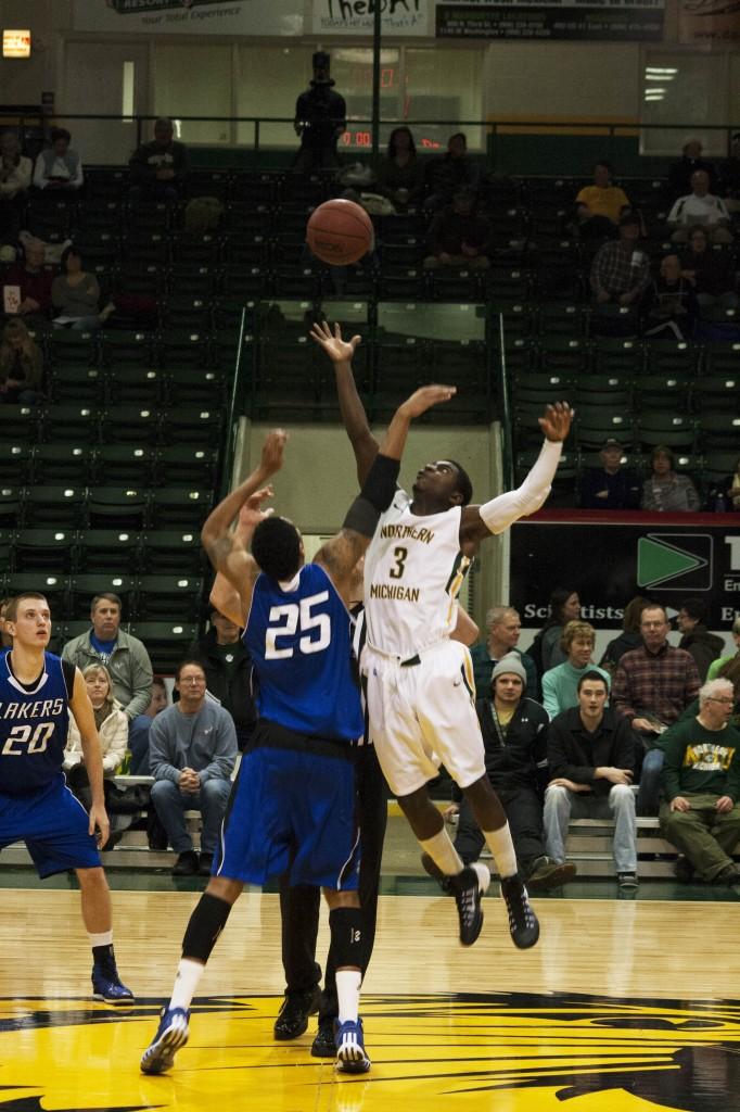 Sophomore guard Terry Nash (3) had four assists and four points for NMU in the 61-59 victory over head coach Bill Sall’s former team, Ferris State. (Anthony Viola NW)