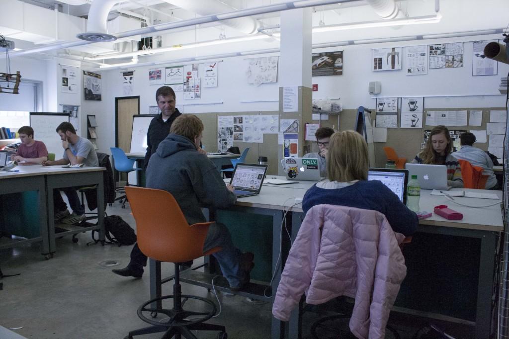 (Anthony Viola/NW)
Associate Professor Peter Pless works with students in the human centered design lab located in the Art and Design building at NMU.