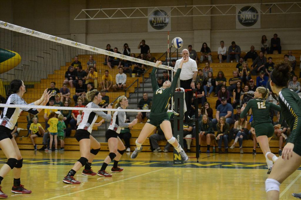 Photo+by+Lindsey+Eaton%3A+In+an+earlier+game+against+Ashland%2C+senior+setter+and+co-captain+Jami+Hogeboom+sets+the+ball+for+an+attack.+The+team+is+tied+with+Michigan+Tech+for+second+in+the+GLIAC.
