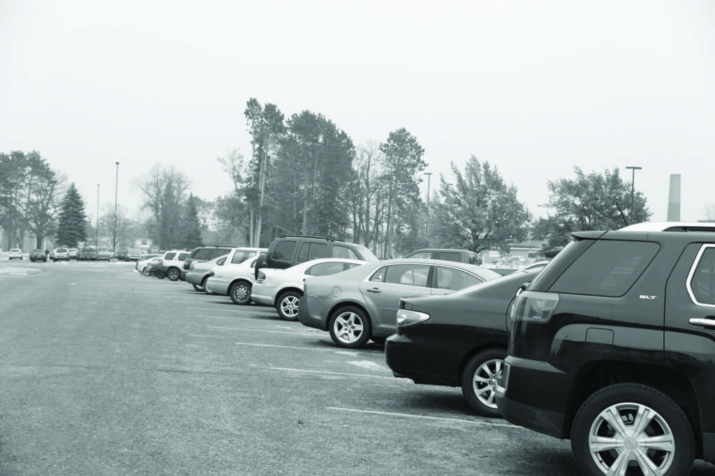 Photo by Kat Torreano: Above are student cars, some of which are offered for NMU’s Ride Share Program.