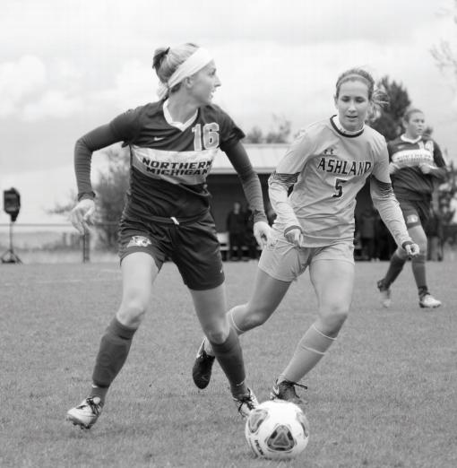 Senior forward/midfielder Aimee Colla looks to pass the ball ahead
to a teammate in a previous game last season against Ashland.
Photo by: Neil Flavin