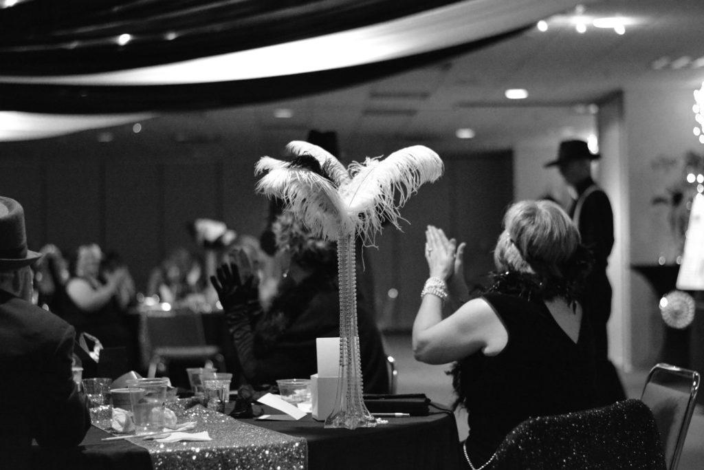 Attendees dressed in 1920s stlyed garb for the first SAYT fundraiser last year. This year, attendees can expect a 1950s prom-style murder mystery. 