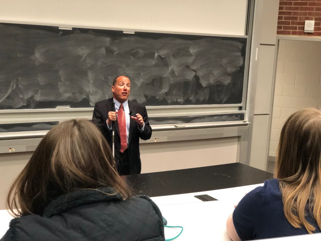 Michigan Supreme Court Justice Richard Bernstein talks overcoming challenges and dealing with blindness as a judge to a group of students, faculty and community members during his visit to NMU last Thursday. Photo by Jackie Jahfetson 