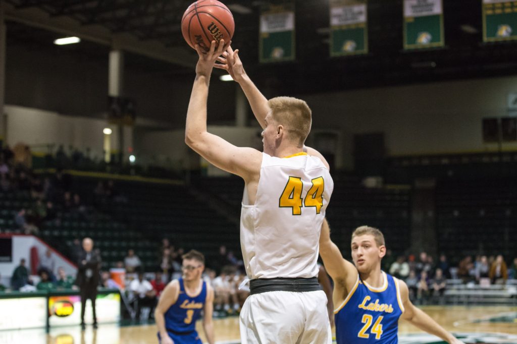 Troy Summers attempts a 3-pointer in a home game vs. Lake Superior State University a year ago. Photo courtesy of NMU Athletics 