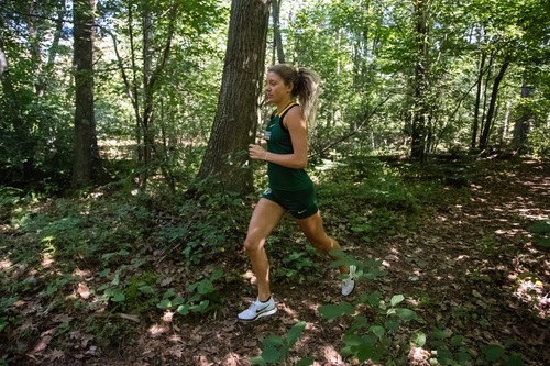 RUNNING FOR BRAGGING RIGHTS—The Wildcats will host Michigan Tech for the cross country U.P. championship. The teams faced off in a scrimmage in the preseason. Photo courtesy of NMU Athletics.