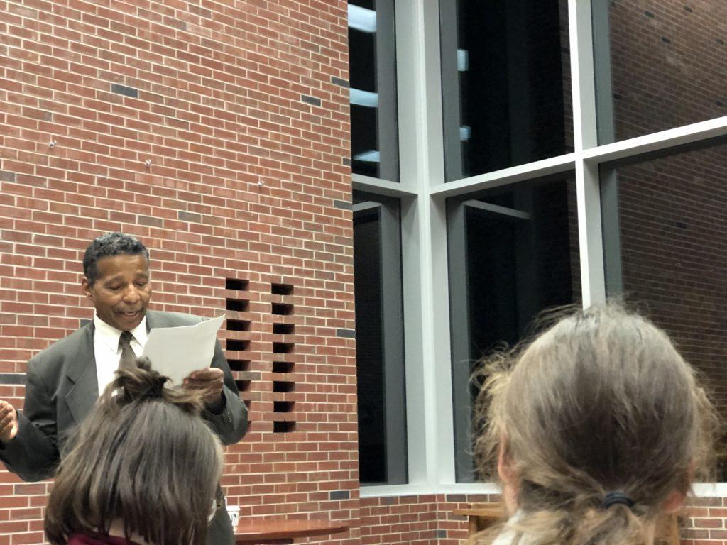 AN ODE TO TONI—Carter Wilson, political science department head, reads a personal piece in memory of Toni Morrison at the open mic night Tuesday, Nov. 19.
Jesse Wiederhold/NW
