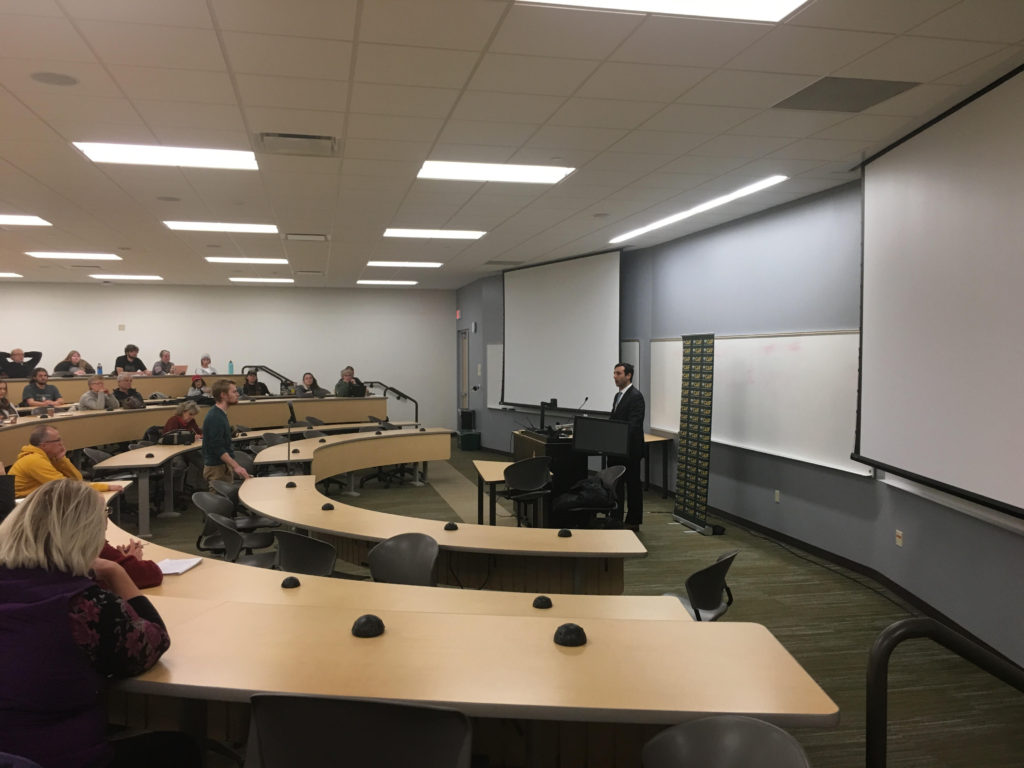 SPEAKING FREELY—Speaker Arthur Milikh faces a student interlocutor, College Republicans representative Doug Zvosec.
