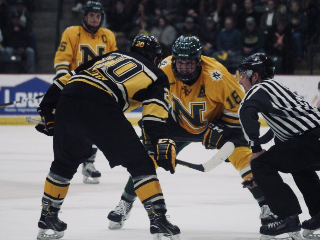 MUCH NEEDED VICTORY—Junior forward Joseph Nardi awaits the face-off during the Wildcats’ home loss against Michigan Tech University (MTU) on Saturday, Nov. 23. After losing four straight games including two to MTU, the ‘Cats won the second game of the doubleheader against Alabama-Huntsville. Photo courtesy of NMU Athletics.