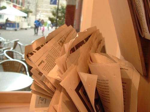 newspapers in a cafe