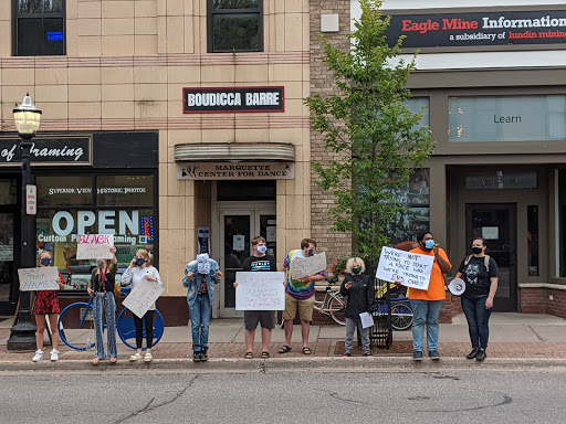 NO JUSTICE NO PEACE: Black Lives Matter protesters stand across from the Marquette County Field Office of the Michigan Republican Party to demand police reform and an end to racial inequality. Left to right: Camry Todd, Brianna Powell, Hannah Powell, Simeon Higgins, Jax Andrés, Ben Prickle, Josie Steed, Fred Sims, Sarah Skinner. 