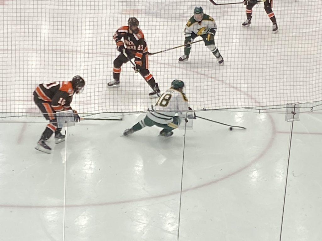 BATTLING BOWLING GREEN—NMU senior forward and captain Joseph Nardi possesses the puck for the Wildcats around a couple of Bowling Green defenders. The Wildcats lost 6-2, and end the regular season with weekend with a series against the Huskies of Michigan Tech. Travis Nelson/NW