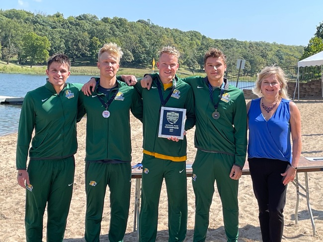 COMING BACK CHAMPS—The NMU Mens Swim and Dive team won the CSCAA Open Water Nationals in Lawrence, Kansas this past weekend. Pictured is the winning team Grant Combs, Jasper Pullinen, Ondrej Zach and Thibault Auger. due to a lack of lifeguards