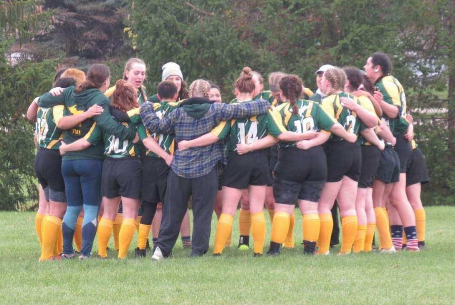 REGIONAL+RUGBY%E2%80%94The+NMU+Northstar+rugby+team+huddles+up+during+an+earlier+game+this+season.+After+defeating+the+University+of+Chicago+43-0%2C+the+team+heads+to+Elkhart%2C+Indiana+for+the+Midwest+Regionals+this+weekend.+Photo+courtesy+of+Rachel+Placeway.