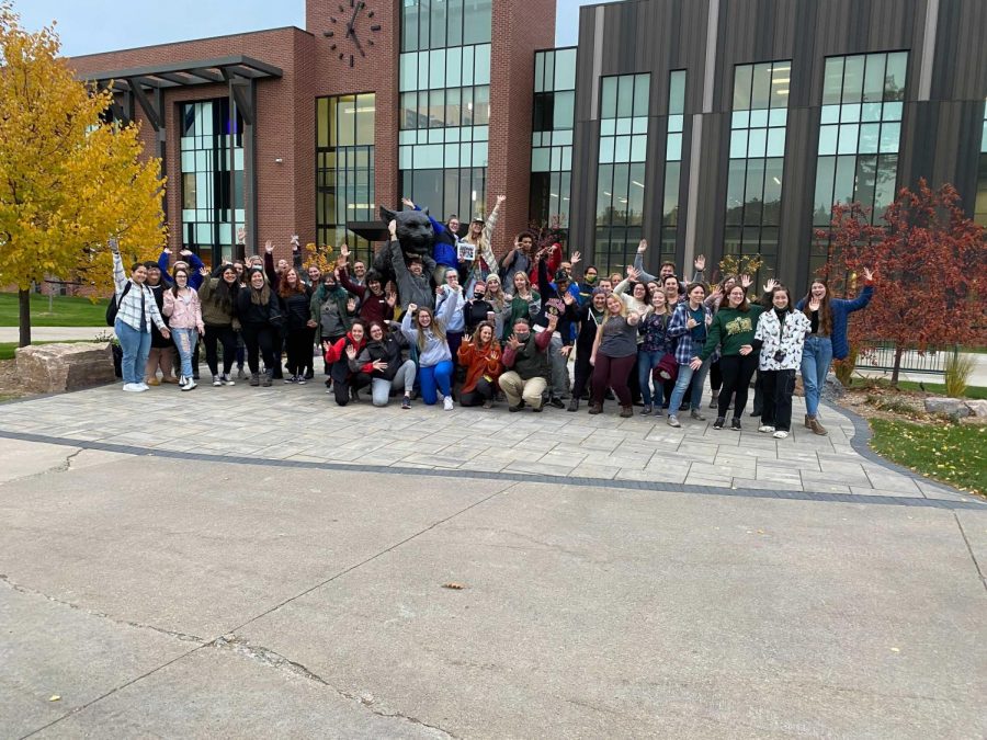 FIRST GENERATION—Students, faculty and staff at NMU kicked off the First Generation Student Day on Monday at the Wildcat Willy statute outside of Jamrich hall. The celebration was followed on the second floor of Hedgecock.