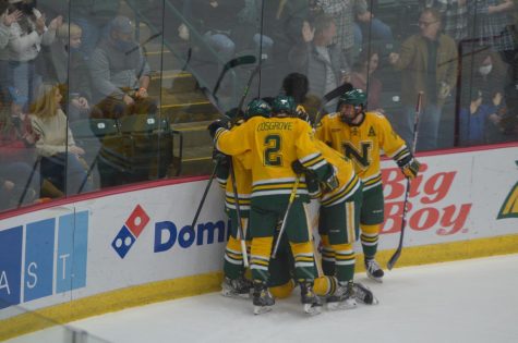 TUESDAY HOCKEY— The Wildcats celebrate a goal against Michigan Tech on Saturday, Nov. 13 at the Berry Events Center. The series with Michigan Tech has been rescheduled to two separate Tuesday games. The first game is Tuesday, Feb. 1 in Houghton, and the second is Tuesday, Feb. 8 in Marquette. Travis Nelson/NW