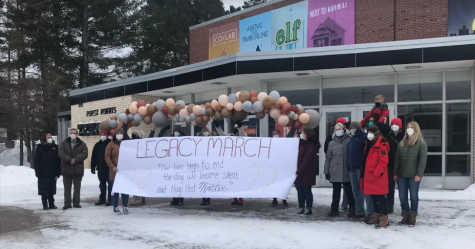 LEGACY—For NMUs MLK Day of Service, participants met outside of Forest Roberts Theatre before marching through campus together towards The Lodge holding a banner showcasing Kings message. 