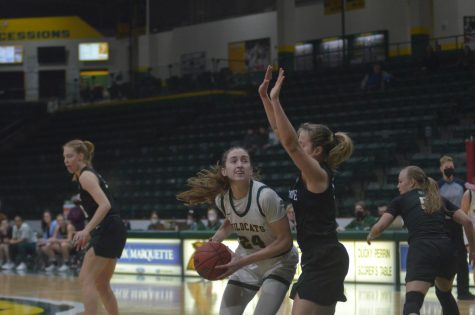 CATS PULL THE UPSET—NMU sophomore guard Makaylee Kuhn drives to the rim during the Wildcats 62-56 win over Wisconsin-Parkside. Travis Nelson/NW 