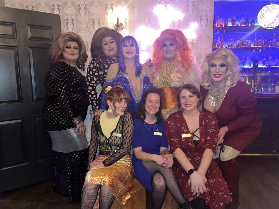Drag queens and staff at the Landmark Inn pose after the Galentines Drag Show on Sunday, Feb. 13. Drag queens in back row (left to right): Shelby Cummins, Victoria Lynn, Cass Marie Domino, Mercedes Benzova, and Loretta Love Lee. Pride Sundays event organizer, Jaime Bedard, sits in the front row, center. 