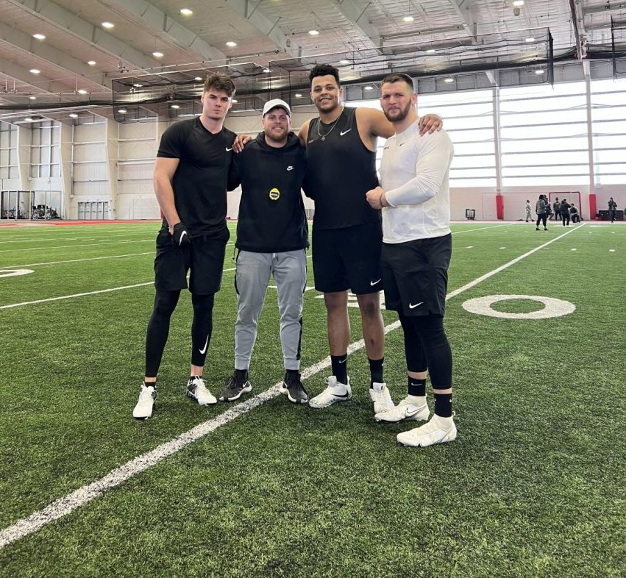 DREAM+CHASERS%E2%80%94Brady+Hanson%2C+Dustin+Brancheau%2C+Payton+Muljo+and+Michigan+Techs+Nate+LaJoie+pose+after+completing+drills+at+the+NFL+pro+day+hosted+by+Saginaw+Valley+State+last+week.+Photo+courtesy+of+Payton+Muljo