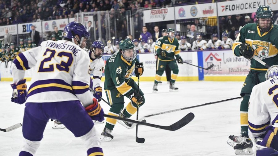 GAME OVER—NMU forward Andre Ghantous controls the puck during the Wildcats 8-1 loss to #1 Minnesota State-Mankato. The Wildcats season comes to an end with a record of 20-16-1. Photo courtesy of NMU Athletics.