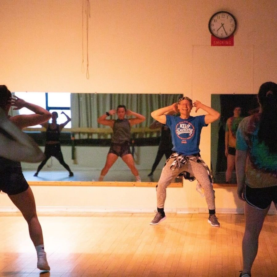 SHAKE IT OFF—Mark Shevy, professor and Zumba instructor, leads a Zumba class with a positive attitude. Shevy will lead the Stress-Buster Zumbathon event tomorrow from 7-8:30 p.m. at the PEIF.