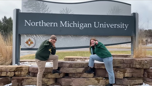 PROMOTED - Abby O’Connell and Jondular Schertz are NMU Marching Band's new drum majors for the '22-'23 season. They are expected to have around seven performances this year which is more than usual and will keep the drum majors busy with practicing for each show.