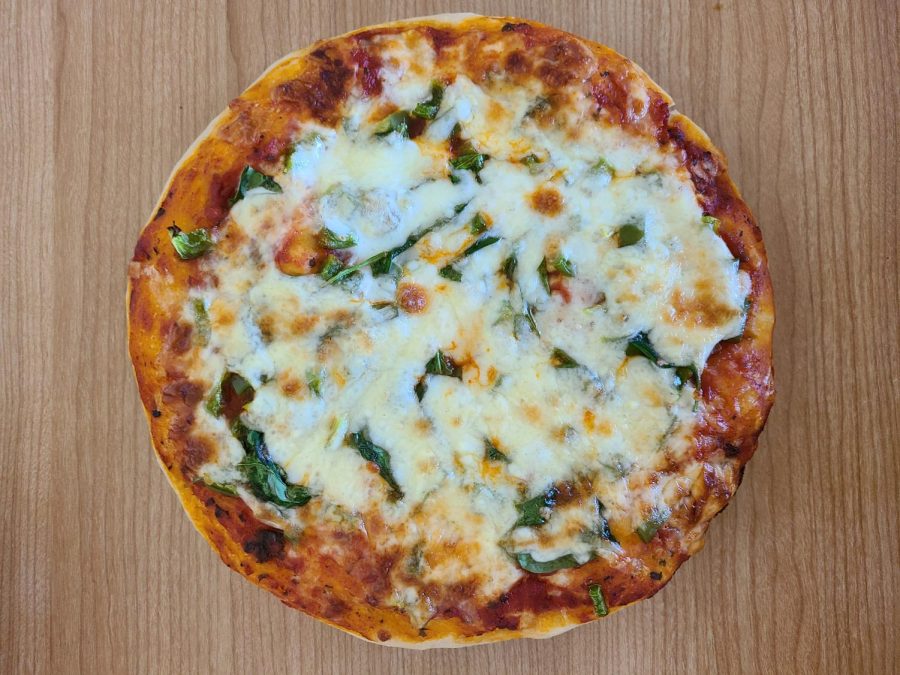 BUILD+YOUR+OWN+%E2%80%94+Homemade+pan+pizzas+are+super+easy+to+make+and+you+can+add+whatever+combination+of+toppings+you+want.+I+made+mine+with+peppers+and+spinach+to+feel+like+I+was+eating+more+veggies.+