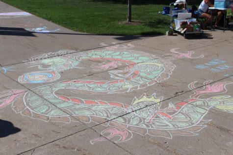 A piece of sidewalk chalk art not part of the homecoming competition.