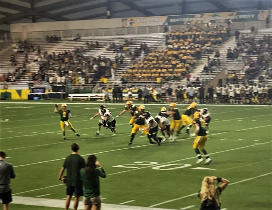 REDZONE - Wildcats quarterback #8 Drake Davis throws to his tight end #12 Charlie Gerhard as NMU gets it into the redzone. The wild cats went 1-2 in the red zone and won the game 13-10.