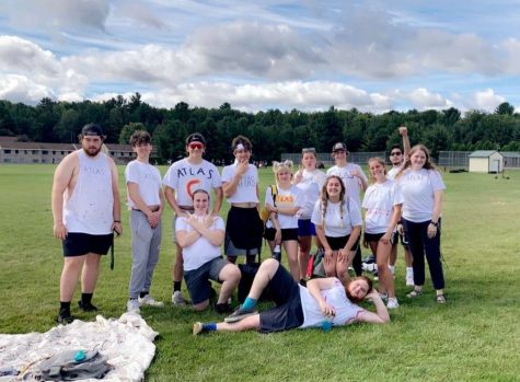 FITTING IN – Team Atlas poses for a photo after their first match of the Annual Kickball Tournament put on by NMU Housing. The kickball tournament is one of the first opportunities for students living in the dorms to find a group of friends within their houses and halls. 