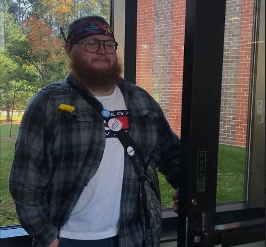 LIFELONG HOBBY - R.J. holds open the door for students for hours at a time during the school year. He has dedicated his time to improving the lives of those around him.