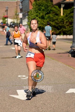 ON THE RUN - Anna Nagy runs the Queen City Half Marathon in Marquette. Nagy has been running since she was in high school and has volunteered at the Marquette Marathon previously. 