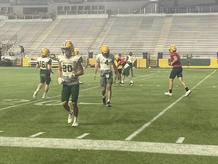 RECEPTION - NMU receiving core practices their route running. 8 different Wildcats caught passes from QB Z. Keen against Wayne State in the 37-30 win.