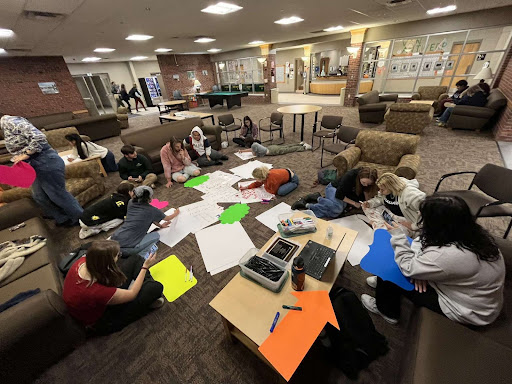 COLLECTIVE SUPPORT — Poster-making at Feminism for All weekly meeting on Oct. 10 in preparation for the annual Slut Walk. The organization will be hosting another pre-poster making event on Oct. 14 at 3:30 p.m. in the Hunt and Van Antwerp residence hall lobbies.