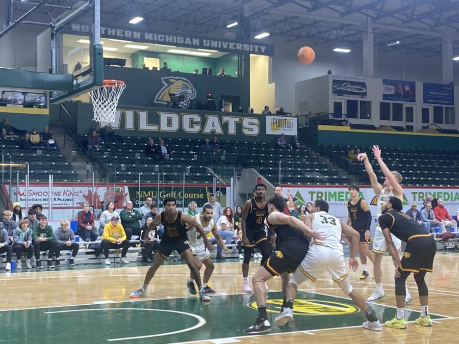 AND ONE - Freshman Dylan Kuehl hits a free-throw after a tough foul. NMU heads home after this weekend for a four-game stand in the Berry.