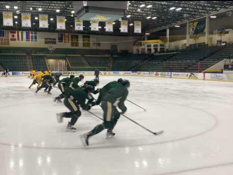 GET READY - The Mens Hockey team warms up in the Berry to get ready for this weekend at Ferris State. The Cats are coming off a weekend split with the MIchigan Tech Huskies.