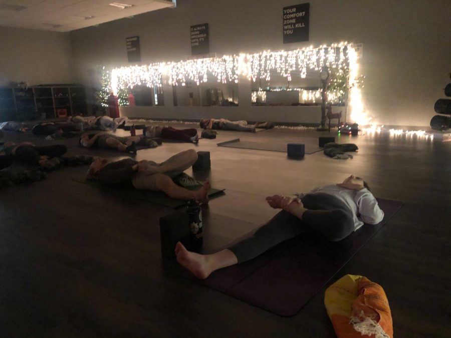 RELAX+-+Grace+Rieger+holds+yoga+classes+each+week+on+Wednesday+from+7-8+p.m.+The+class+is+a+great+way+to+start+a+healthy+lifestyle+and+meet+like-minded+people.