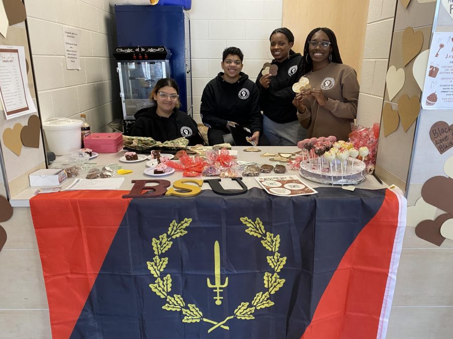 BLACK LOVE DAY — Black Student Union (BSU) members Khaleah Lowllun, Brianna Artis, Khadejah Thompson and Marlanaysia Rosser (pictured left to right) sell baked goods to NMU students during their Black Love Day Bake Sale in Jamrich Hall, Monday, Feb. 13. The holiday celebrates Black love in addition to Valentines Day.