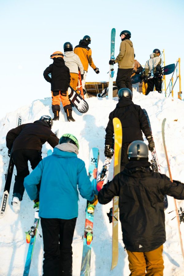 COWABUNGA+%E2%80%94+Riders+line+up+before+the+Irontown+Rail+Jam+on+the+first+night+of+festivities.+