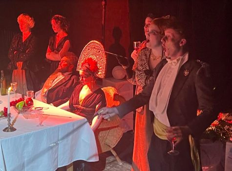 SPITE AND MALICE - A scene from Salome with King Herod seated at the table. The play has been in rehearsals following winter break, with six performances scheduled in the Black Box Theatre.