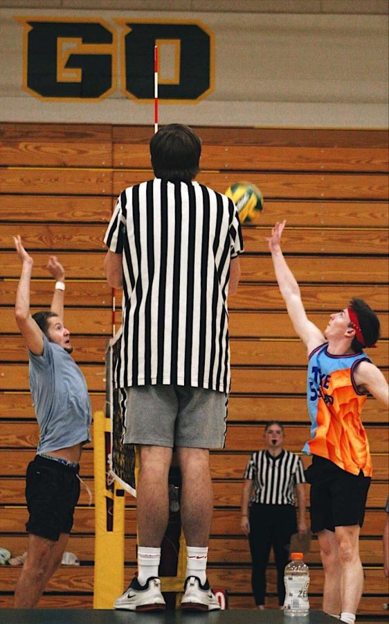 GET ACTIVE - Two intramural volleyball players face off at the net. NMUs Club Volleyball is open to all students and encourages a friendly and active environment where you can meet new friends. 