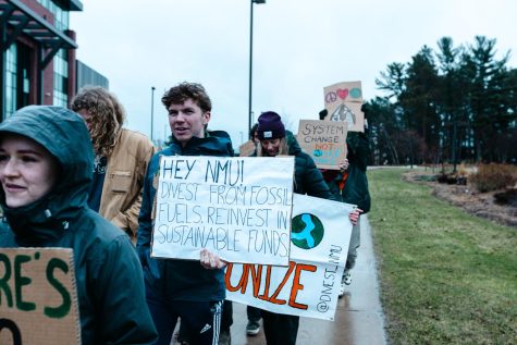 CLIMATE ACTION MARCH - Students march for climate action, encouraging NMU to divest their funds from fossil fuels and to reinvest in sustainable energy.