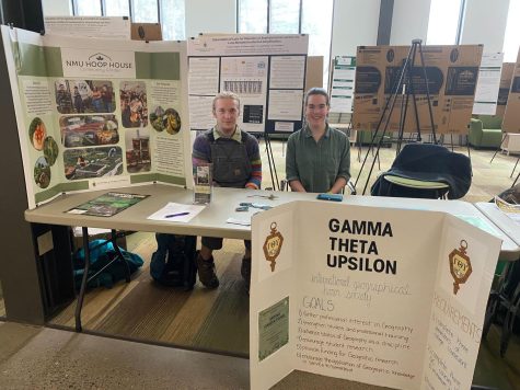 EARTH FEST — Environmental student organizations collaborated to host Earth Fest during the ninth annual Andertons Earth Week at NMU. Pictured: Jonas Trombetta, Hoop House (left) and Mary Kelly, Gamma Theta Upsilon and Hoop House (right). 
