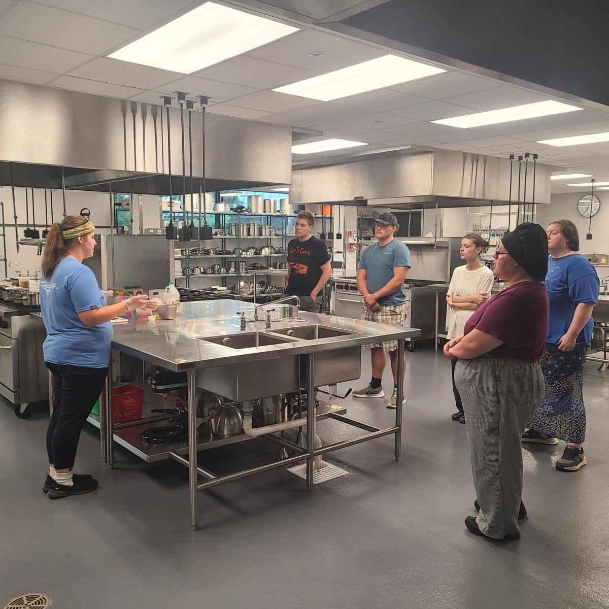 SOMETHING IS COOKING — The Hospitality Club hosted a cooking demo with Chef Alex Palzewicz, showing students how to use simple ingredients for simple recipes. 
