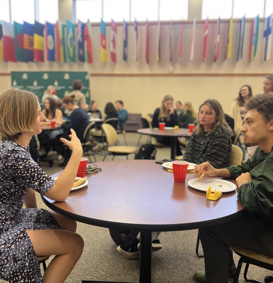 NEW FRIENDS — Students gather to discuss their experiences and what they expect from the program.