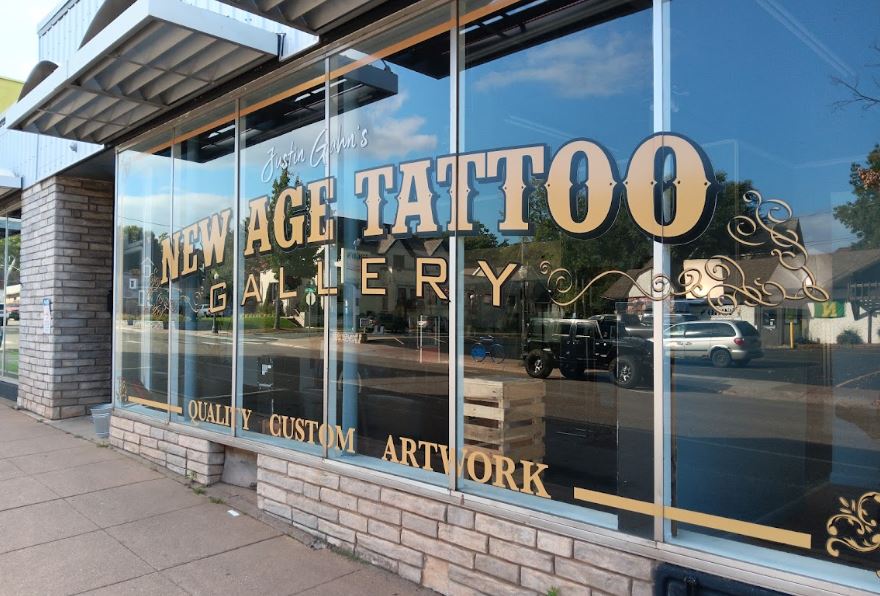 RIGHT AROUND THE CORNER — New Age Tattoo, one of the few places around town at which anyone can get a tattoo. While I have yet to get one myself, I cant say I havent looked up their prices online before.