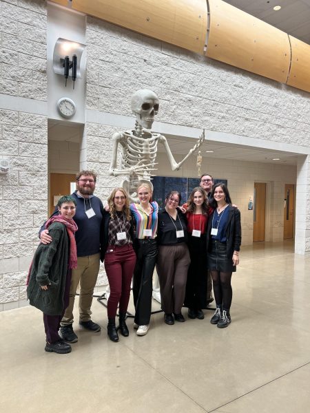 SING YOUR HEART OUT — NMU Choir students (left to right) John Fatla, Anna Morozov, Jessica Schrader, Kassidy Bush, Ava Brege, Sophia Balzarini, Michael Buhler and Sophia Laskaris attended the ACDA conference in Mount Pleasant. They listened to concerts performed by high school choirs and practiced their own choral skills while meeting and networking with other choir students. Photo courtesy of Sophie Laskaris.