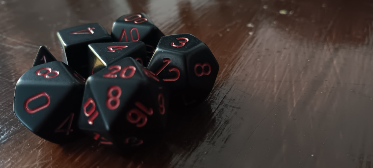 20 SIDED DIE — My dice set for D&D, including the frequently used d20. Losing sets of dice has become a regular habit for me, as this is the third Ive bought.